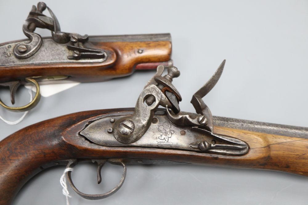 Two 19th century flintlock pistols, 4in. and 11in. barrels